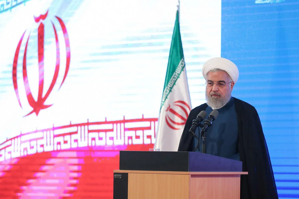 A handout picture provided by the Iranian presidency on August 27, 2019, shows President Hassan Rouhani speaking during a ceremony in the capital Tehran. (AFP)