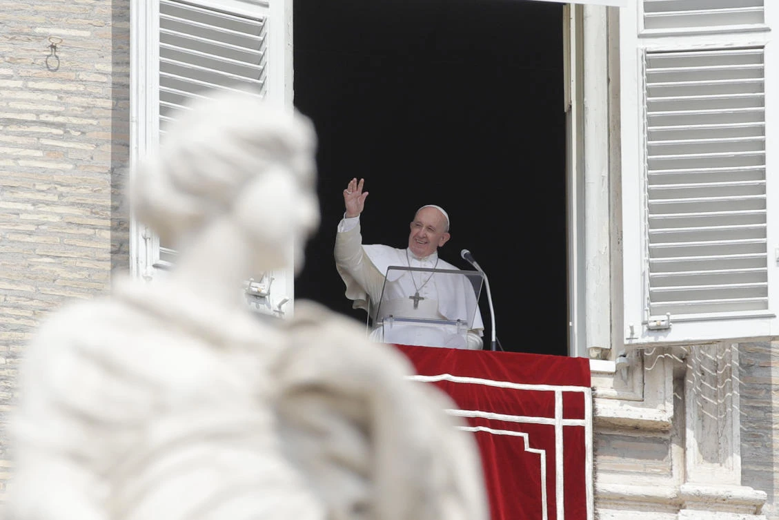 Pope Francis waves to the crowd as he arrives to recites the Angelus noon prayer from the window of his studio overlooking St.Peter's Square, at the Vatican, Sunday, Sept. 1, 2019. (AP)