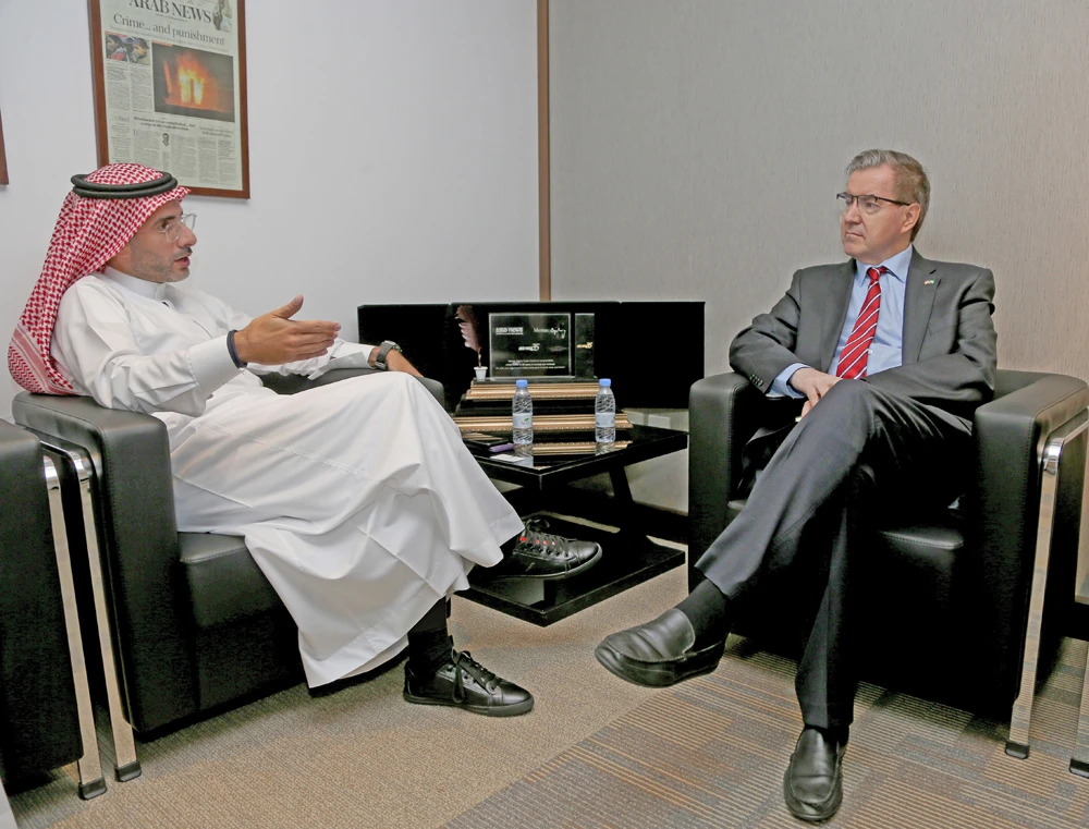 Norwegian Ambassador Oyvind Stokke (right) meeting with Editor in Chief Faisal J. Abbas at the Arab News headquarters in Riyadh. (AN photo)