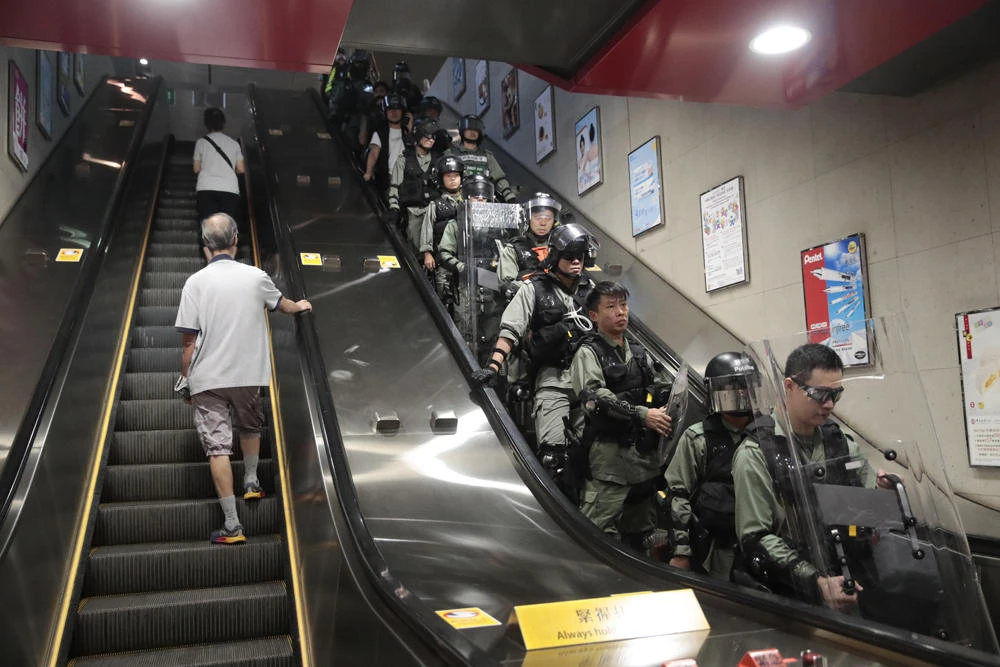 Hong Kong protesters target trains, urge general strike