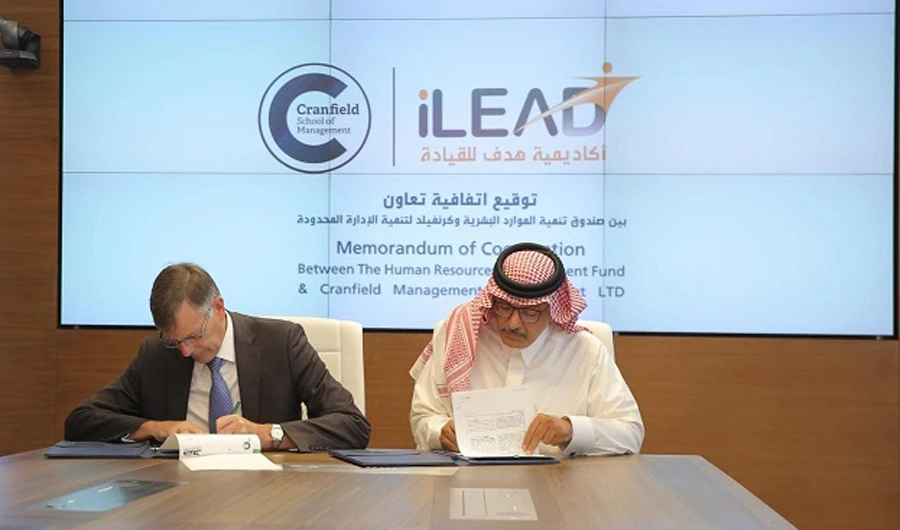 Dr. Mohammed bin Ahmed Al-Sudairy, Director General of the Human Resources Development Fund (Hadaf), and Cranfield University CEO Peter Gregson signing the cooperation agreement in Riyadh on Sunday. (HADAF photo)