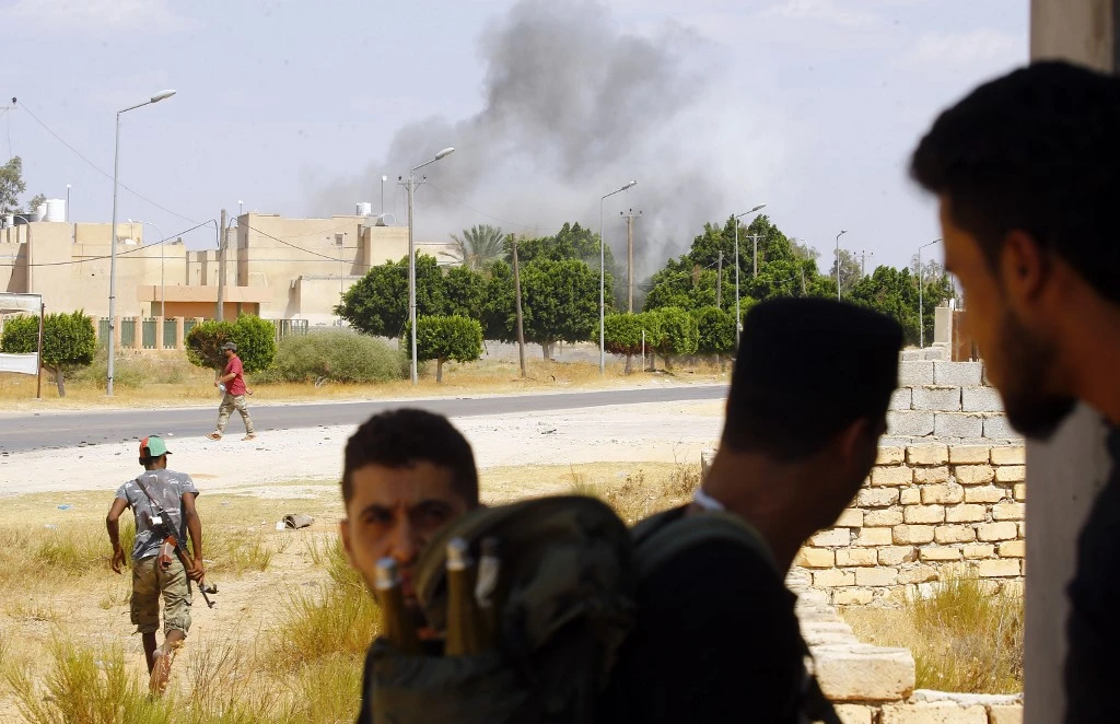 Fghters loyal to the UN-recognised Government of National Accord (GNA) during clashes with forces loyal to Khalifa Haftar, in Espiaa, about 40 kilometers south of Tripoli last month. (AFP/File photo)