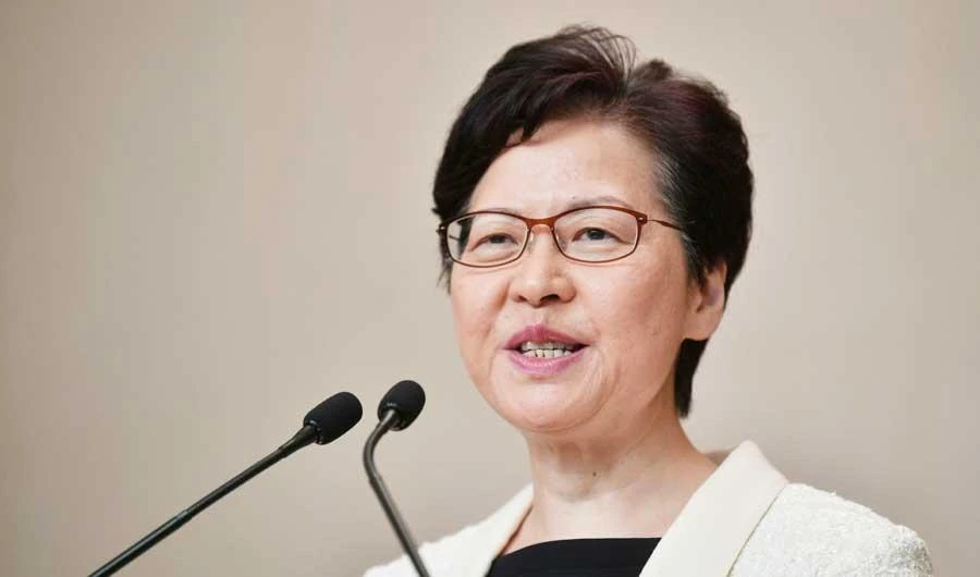 Hong Kong leader says China backs her ‘all the way’