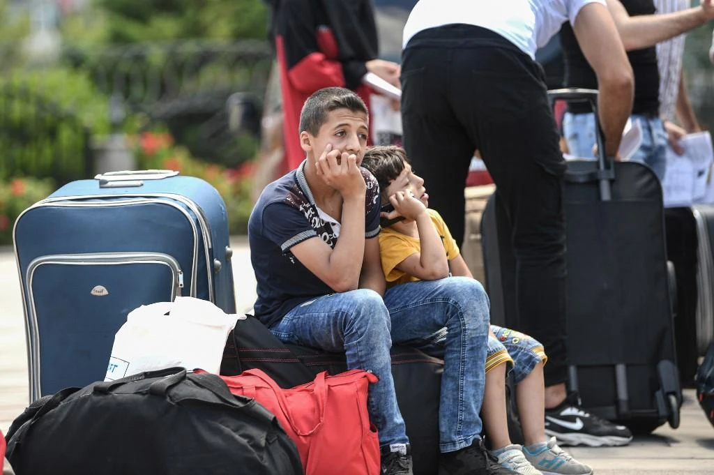 Erdogan has threatened to allow Syrian refugees to leave Turkey for Western countries. (File/AFP)