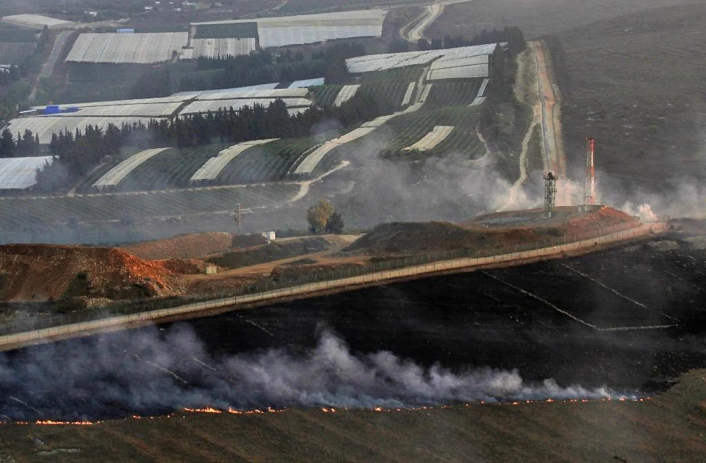 Smoke rises from fires along the border with Israel on the Lebanese side following an exchange of fire between Israeli forces and Hezbollah fighters on September 1, 2019. (AFP)
