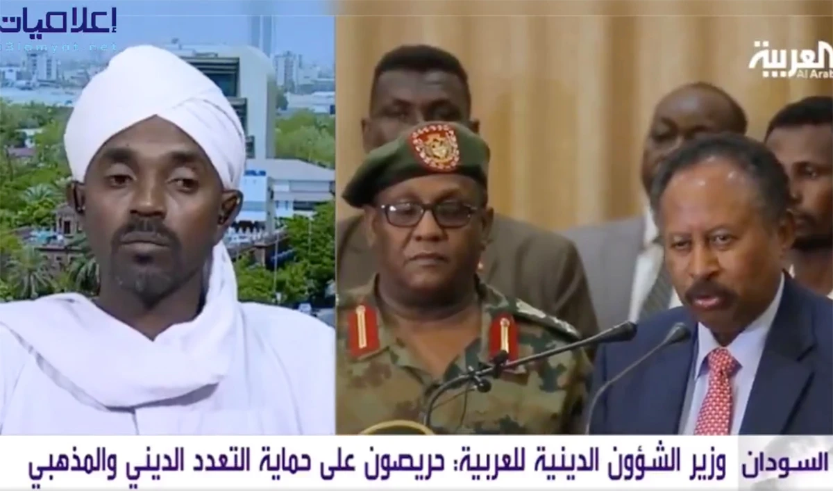 Minister of Religious Affairs Nasr-Eddin Mofarah, left, was included in Sudan’s Prime Minister Abdalla Hamdok new government. (Videograb)
