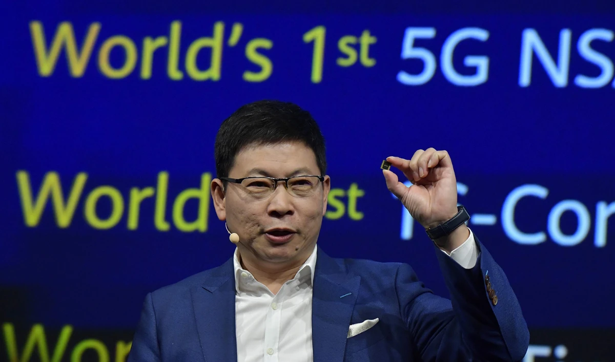 Richard Yu (Yu Chengdong), head of Huawei's consumer business, presents a Kirin 990 5G chip set at the international electronics and innovation fair IFA in Berlin. (AFP)