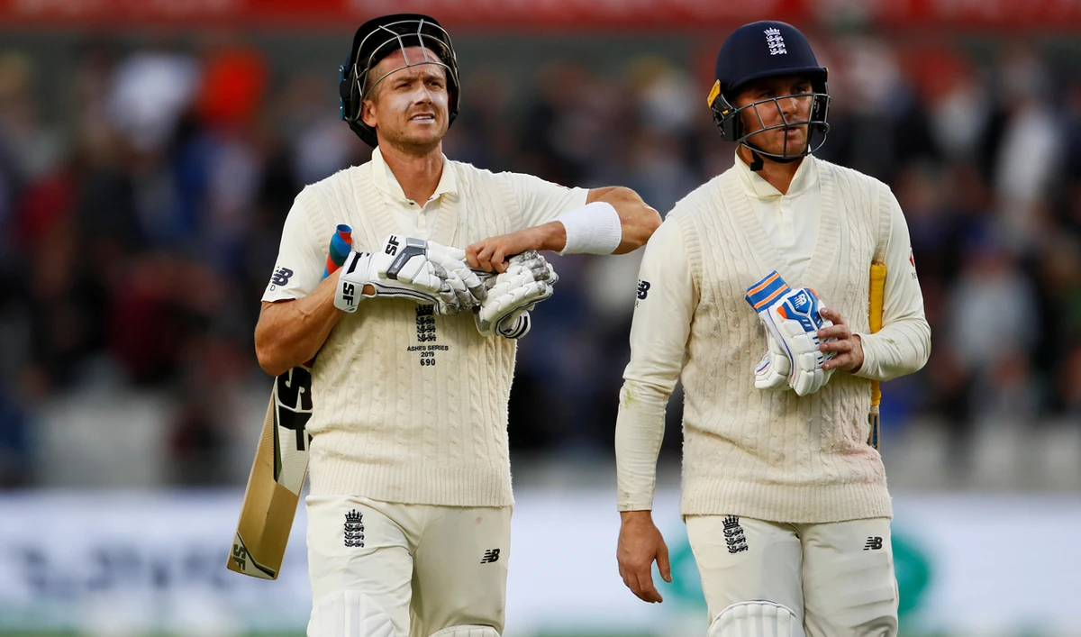 England's Jason Roy and Joe Denly leave the pitch at stumps. (Reuters)