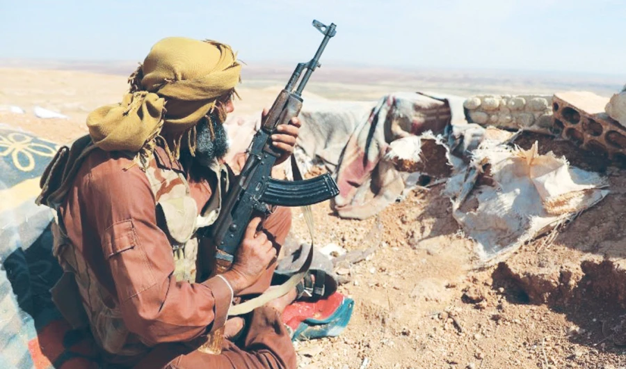 An opposition fighter belonging to National Liberation Front in southwest Idlib province as the Russian Defense Ministry urges insurgent factions to join the cease-fire. (AFP)