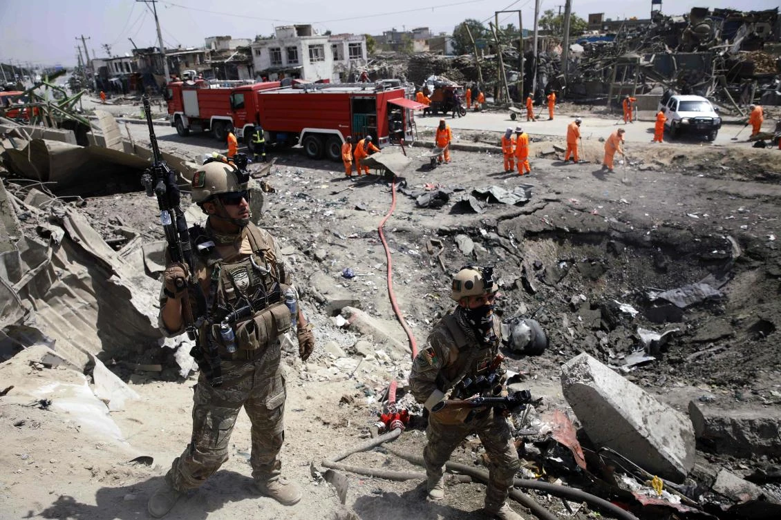 Afghan security forces secure the site a where tractor packed with explosives exploded the night before at the Green Village in Kabul on September 3, 2019. (AFP)