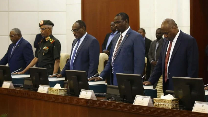 Sudan's new cabinet is sworn in at the presidential palace in Khartoum. (Getty Images)