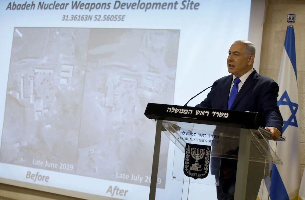 Israeli Prime Minister and Defence Minister Benjamin Netanyahu delivers a statement to the media on the Iranian nuclear issue at the Foreign Ministry in Jerusalem on Monday. (AFP)