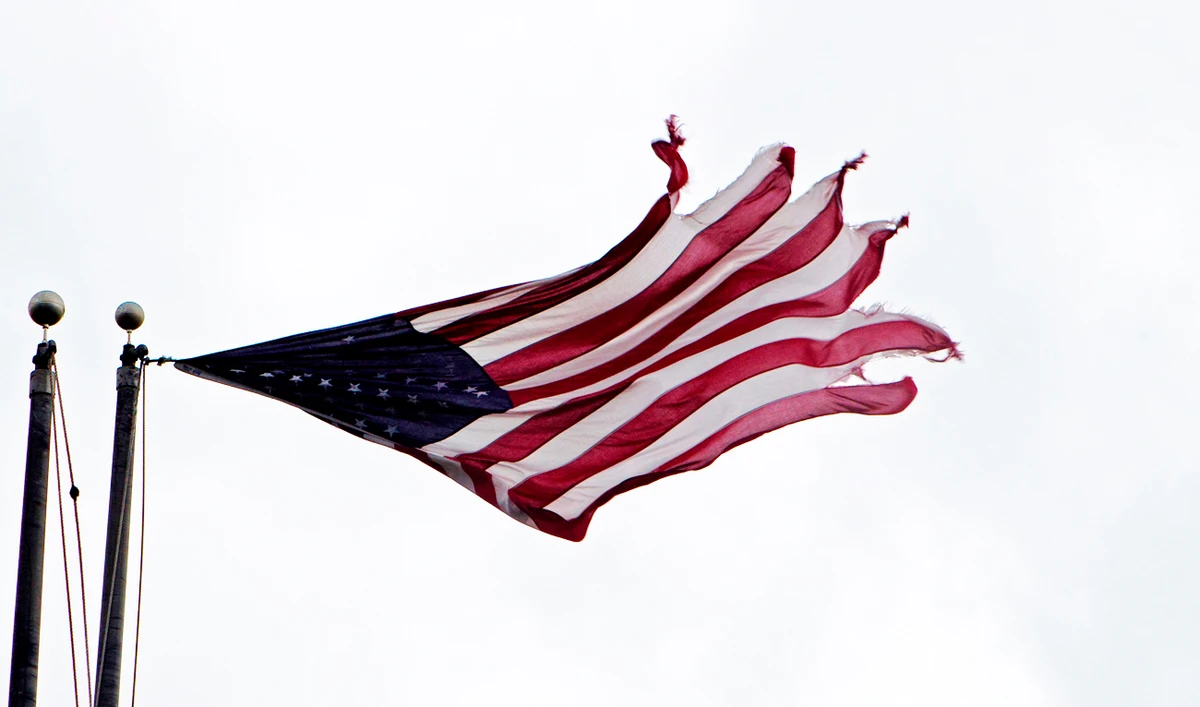 An American flag is seen in Rodanthe as Hurricane Dorian hits Cape Hatteras in North Carolina. (AFP)