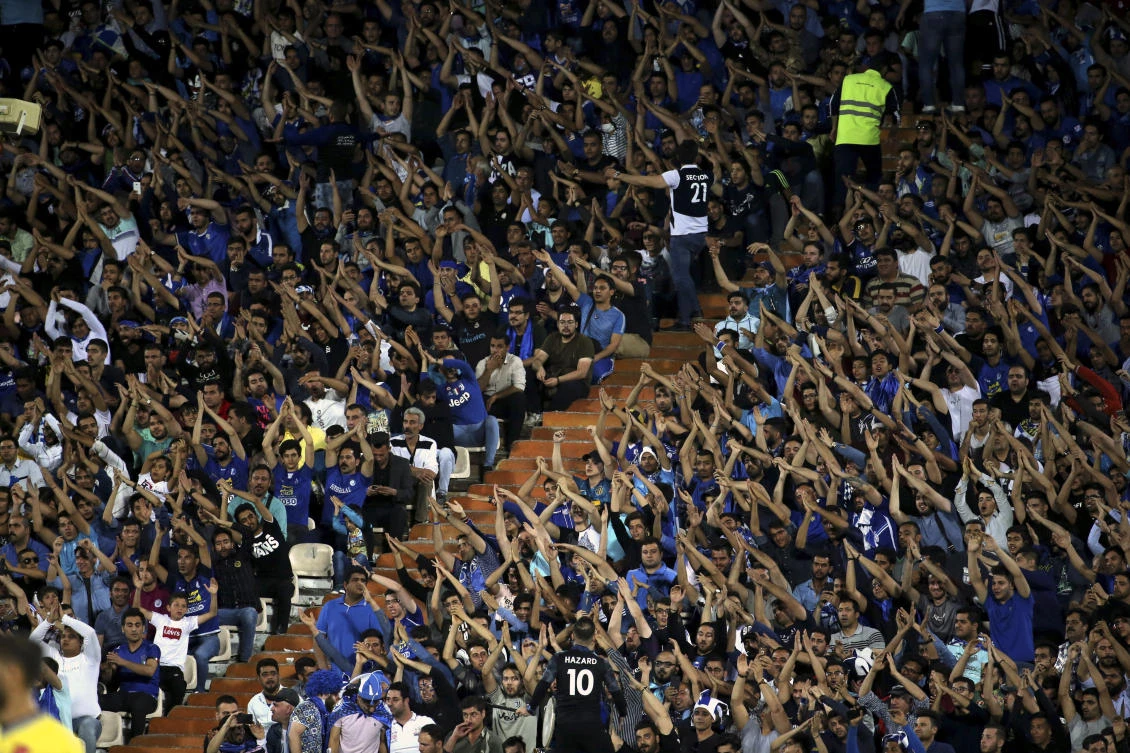 She was known as the “Blue Girl” on social media for the colors of her favorite Iranian soccer team, Esteghlal. (File/AFP)