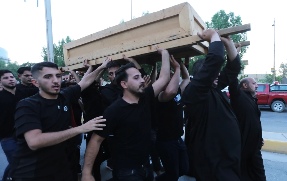 31 killed after walkway collapse triggers stampede at Iraqi Shiite shrine