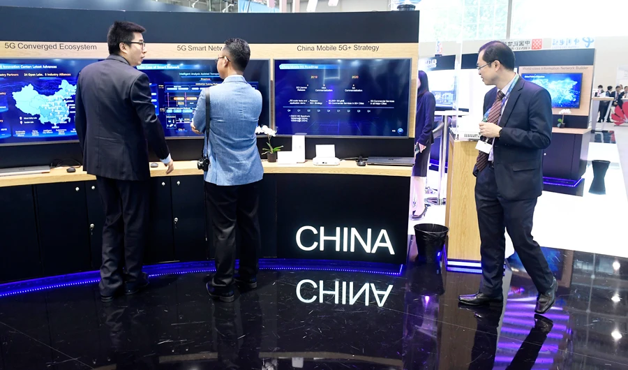 Exhibitors stand at the Chinese Pavilion on the opening day of the ITU Telecom World 2019 conference organised by the International Telecommunication Union (ITU) in Hungexpo Fair Centre in Budapest, Hungary, Monday, Sept. 9, 2019. (AP)