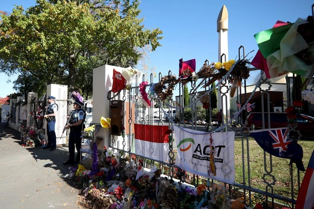 Armed police officers stand guard outside the Al Noor mosque during Friday prayers in Christchurch, New Zealand on May 3, 2019. (AFP)