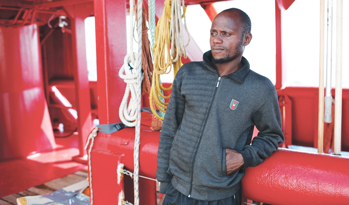 Mouctar Diallo, from Guinea, looks out from aboard the Ocean Viking rescue ship, in the Mediterranean Sea on Friday. (AP)