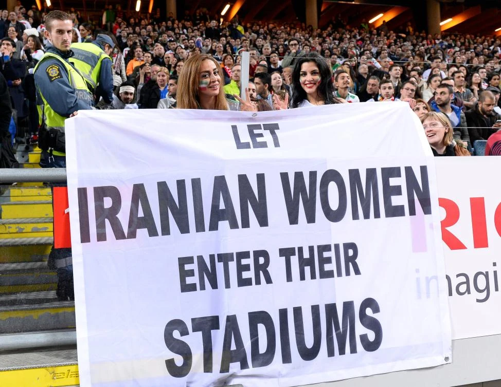 Supporters hold a banner reading ‘Let Iranian women enter their stadiums’ during the friendly international football match between Sweden and Iran at the Friends Arena in Solna near Stockholm in this on March 31, 2015 photo. (AFP)