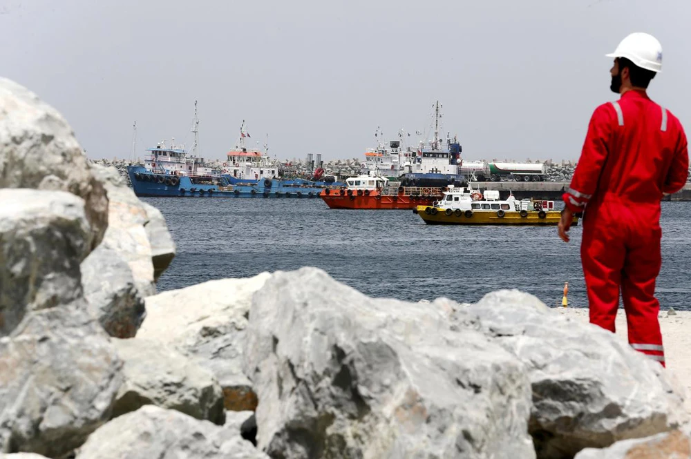 A technical staff is seen standing at the Port of Fujairah, UAE. (Reuters)