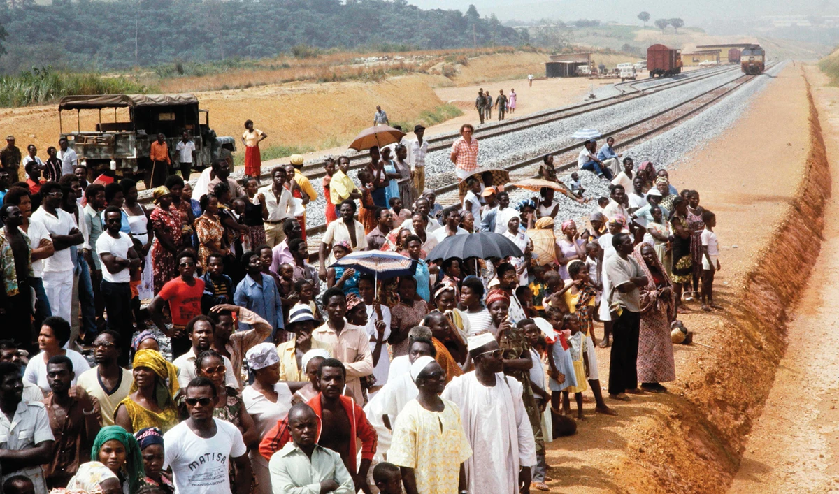 Gabonese gather in 1983 during the inauguration of the second phase of Transgabonais project. Today, about 320,000 people travel on the train per year. (AFP)