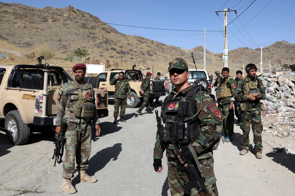 Afghan special forces stand guard at the site of a suicide car bomb explosion that killed at least four people, on outskirts of Kabul, ON Sept. 12, 2019. (AP Photo/Ebrahim Noroozi)