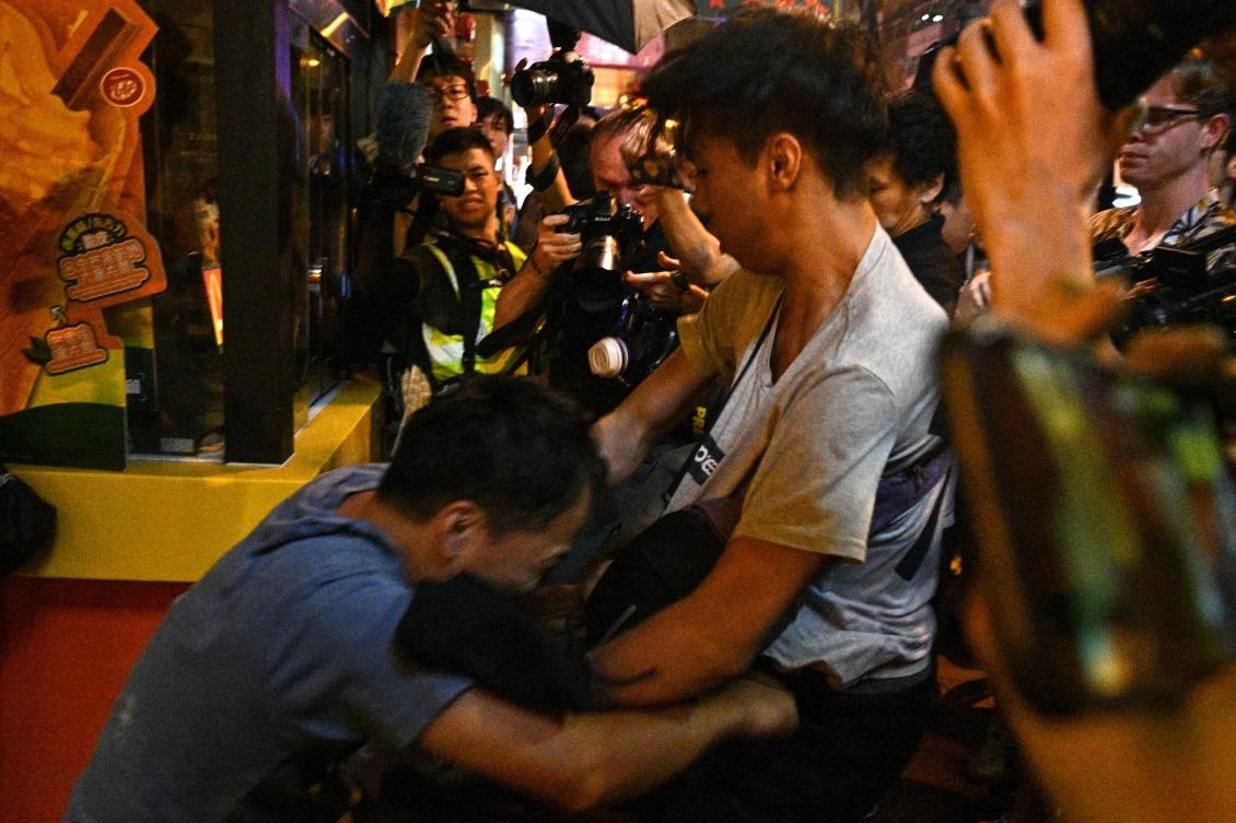 Police on Monday expressed ‘severe condemnation’ after a mostly peaceful protest spiraled into violence in some of the Chinese territory’s key districts. (AFP)