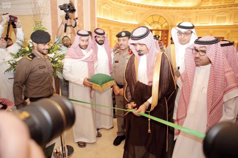 Lt. Gen. Saeed bin Abdullah Al-Qahtani cuts the ribbon to open the Saudi International Fire Safety Conference 2019 in Riyadh. (SPA)