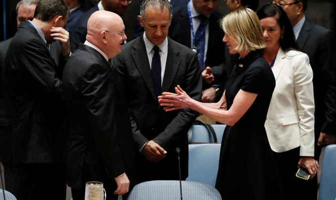 New US Ambassador to the United Nations Kelly Craft greets Russian Ambassador to the UN Vasily Nebenzya as she arrives for her first UN Security Council meeting at UN headquarters in New York on Sept.12, 2019. (REUTERS/Mike Segar)