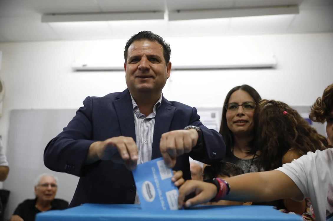In this Tuesday, Sept. 17, 2019. file photo, Israeli Arab politician Ayman Odeh casts his vote in Haifa, Israel. Israel’s Arab coalition appears poised to emerge as the main opposition bloc following Tuesday’s vote. (AP