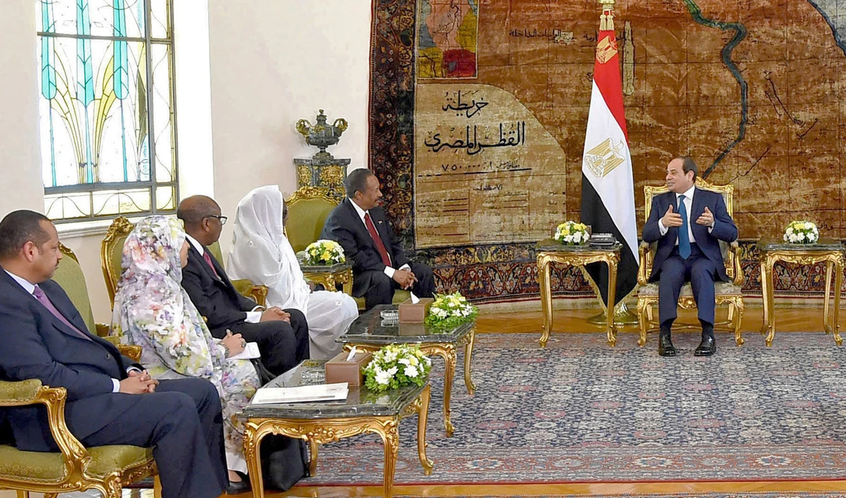 Egyptian Presidency shows Egyptian President Abdel Fattah El-Sisi meeting with Sudan's Prime Minister Abdalla Hamdok at the Ittihadia presidential palace in the capital Cairo. (AFP)