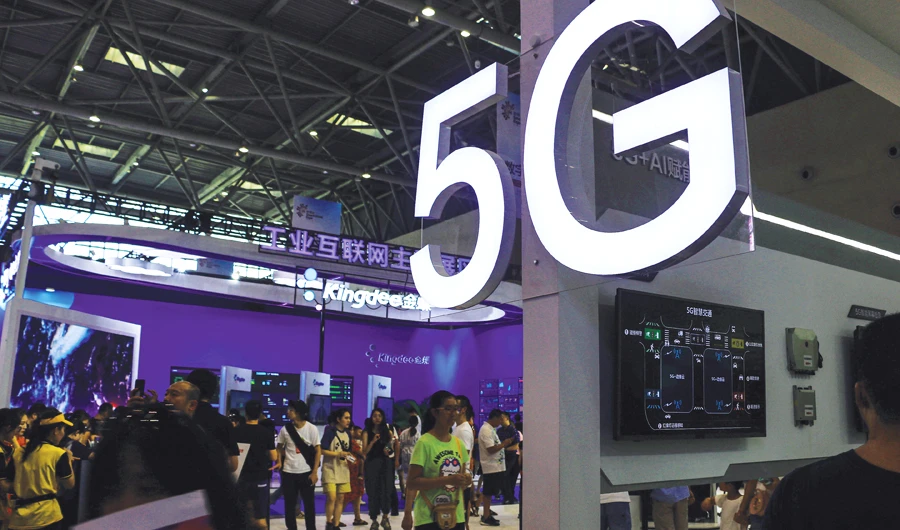 China’s big three state telcos are racing to roll out 5G services in more than 50 cities this year, following countries such as South Korea and the US. (AP)