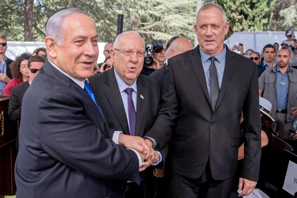 With Benny Gantz’s Blue and White party, right, winning 33 seats out of 120 and Prime Minister Benjamin Netanyahu’s right-wing Likud, left, winning 31; Israeli President Reuven Rivlin plans to begin consultations soon to decide who to choose to try to form a government. (AFP)