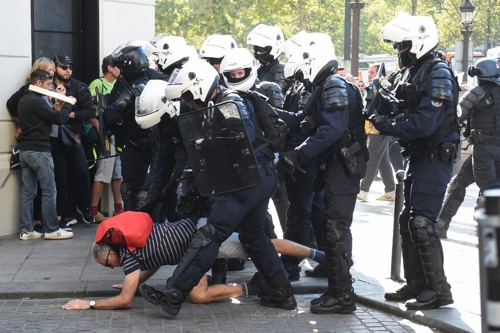 French police arrested yellow vest protesters on Saturday, some of them had been found to carry hammers or petrol canisters. (AFP)