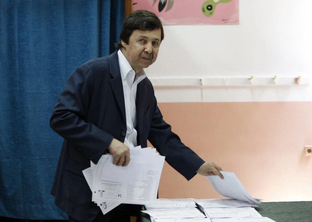 In this Thursday, May 4, 2017 file photo, Said Bouteflika, the brother of Algerian President Abdelaziz Bouteflika, takes ballots before voting in Algiers. (AP)