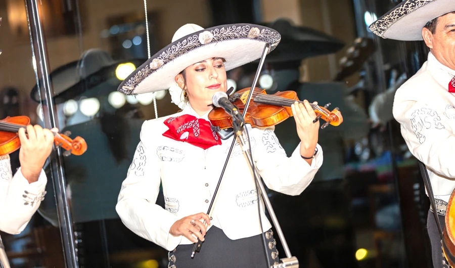 The mariachi band ‘Mariachi Semblanza’ performs live for guests at the food fest.