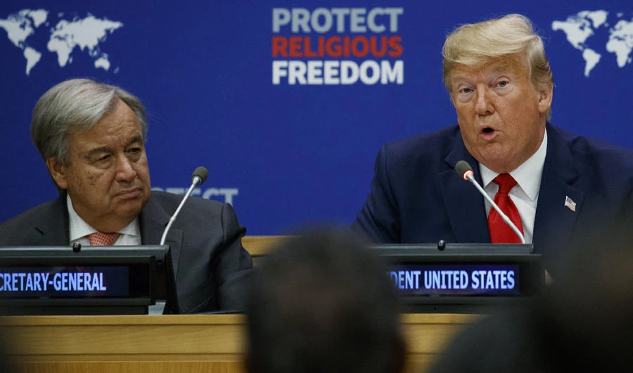 United Nations Secretary-General Antonio Guterres listens as President Donald Trump speaks at an event on religious freedom during the United Nations General Assembly ON Sept. 23, 2019, in New York. (AP Photo/Evan Vucci)