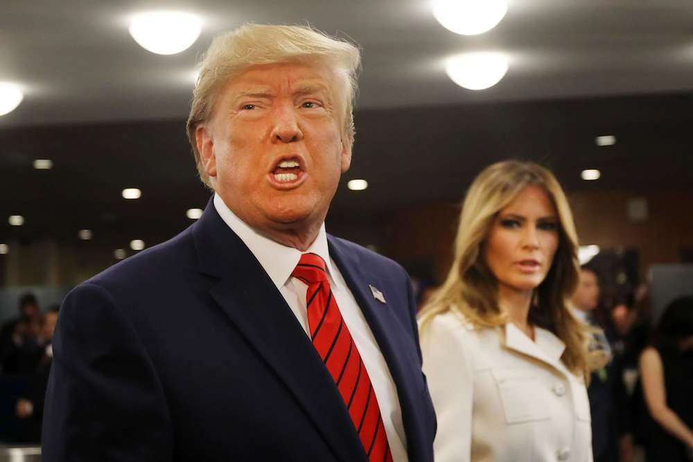 Donald Trump, accompanied by first lady Melania Trump, speaks to the media ahead of his address at the United Nations General Assembly on Tuesday. (Reuters)