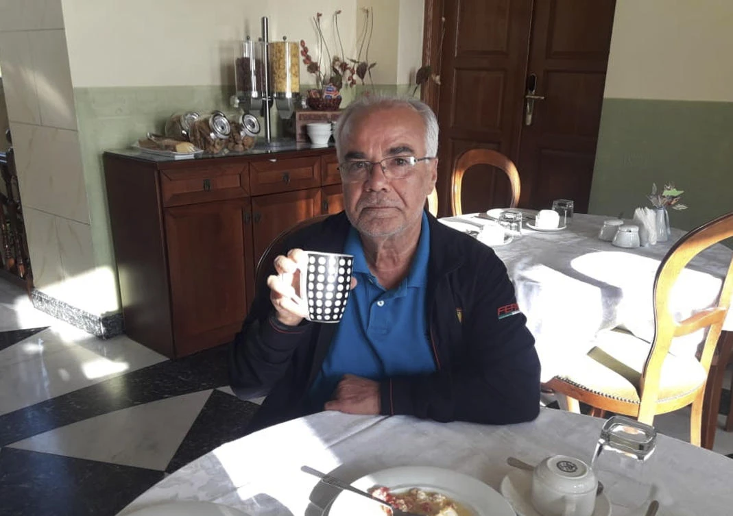 This photo provided by the Mohammed Saleh family, shows Mohammed Saleh having breakfast at a hotel on the Greek island of Syros, Tuesday, Sept. 24, 2019. (AP)