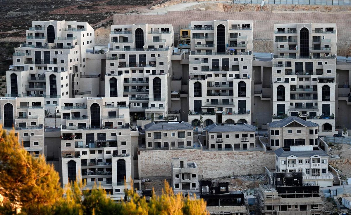 This picture taken on September 25, 2019 shows ongoing construction work in the Israeli settlement of Givat Zeev, near the Palestinian city of Ramallah in the occupied West Bank. (AFP)