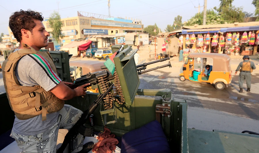 An Afghan policeman stands guard at a checkpoint in Jalalabad, Afghanistan September 26, 2019. (Reuters)