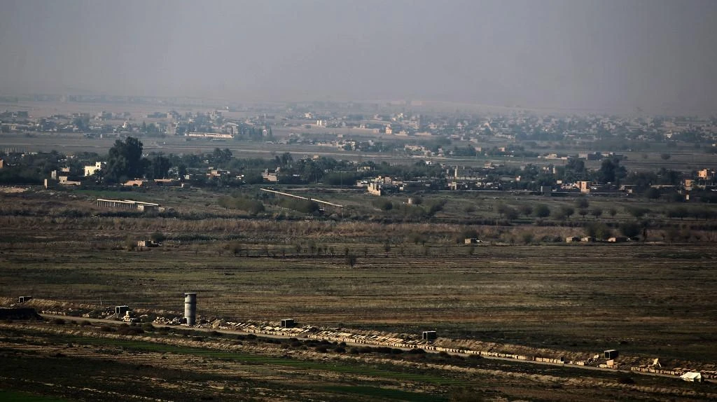 Above, the border crossing between the Syrian city of Albu Kamal, above, and Qaim in Iraq’s Al-Anbar province will be opened for travelers and trade. (AFP)