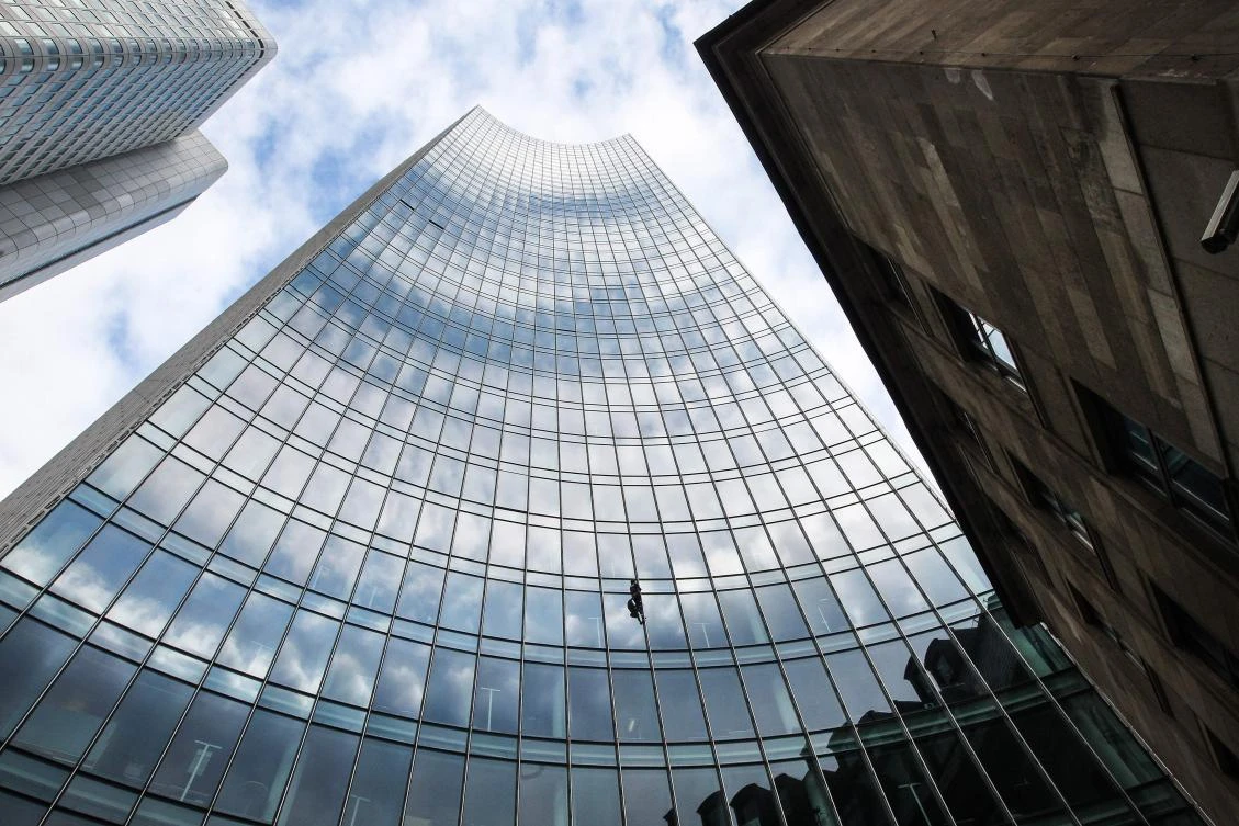 Alain Robert, dubbed the French ‘Spiderman’ for his exploits in climbing buildings, reached the top of 154-meter, 42-floor Skyper building in just half an hour. (AFP)