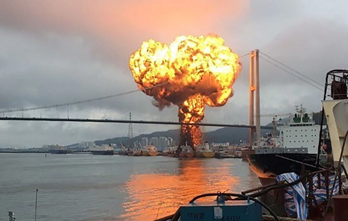 A fireball rises above a cargo ship in the port of Ulsan, on the southeast coast of South Korea, on September 28, 2019. (AFP)