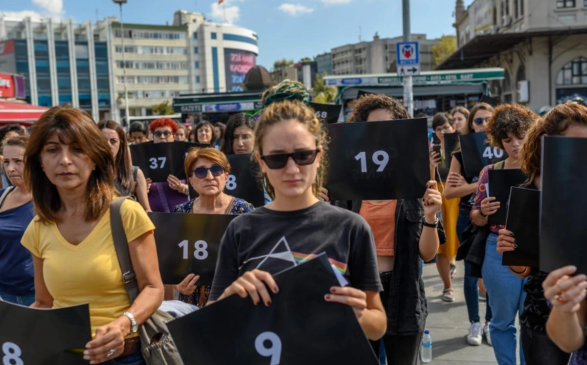 Women hold signs with different numbers symbolizing the women murders during a protest against gender violence in Istanbul, at Kadikoy on September 28, 2019. (AFP)