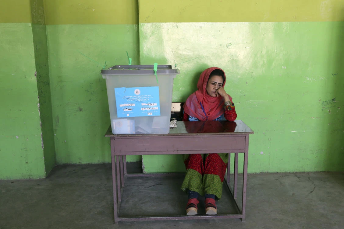 Afghans headed to the polls on Saturday to elect a new president amid high security and Taliban threats to disrupt the elections. (AP)