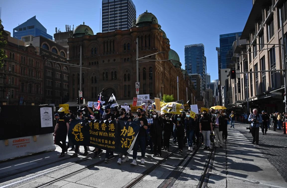 Supporters of the Hong Kong pro-democracy protesters march during a demonstration as part of the global "anti-totalitarianism" movement in Sydney on September 29, 2019. (File/AFP)