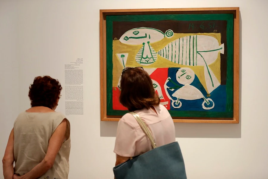 Visitors enjoy Pablo Picasso’s ‘Mother and Children’ (1951) at the Sursock Museum. (AFP)