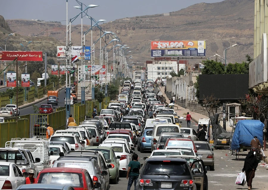 Cars in Yemen queue to a petrol station in Sanaa. (Reuters)