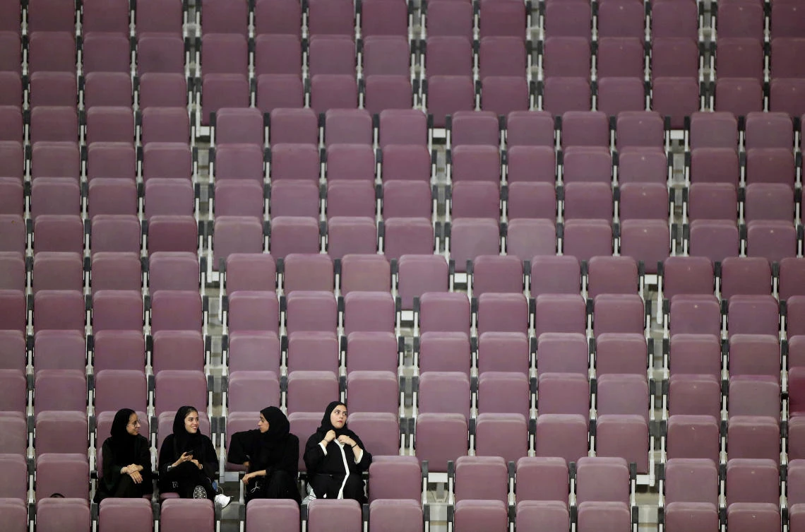 Spectators sit in nearly empty seats the world athletics championships in Doha on Monday. (AP)